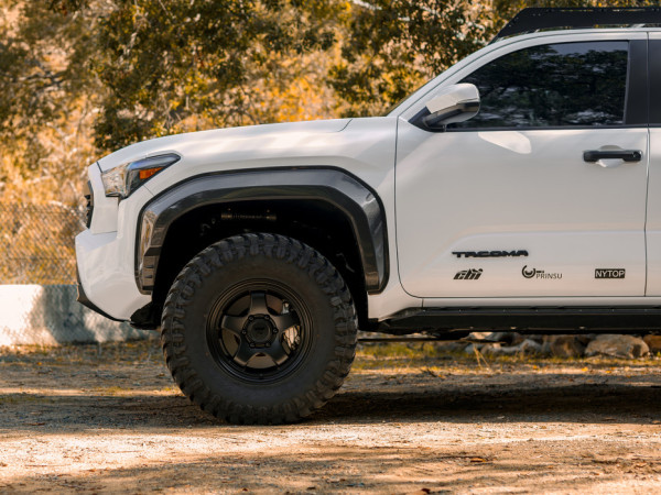 Toyota Tacoma on 35x12.50R17LT TRAIL BLADE M/T - image 8